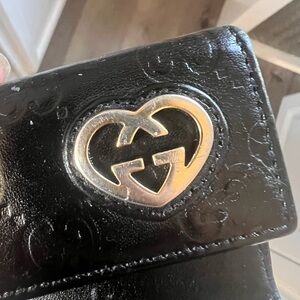 Preloved Gucci keyholder - reconditioned with black leather dye.